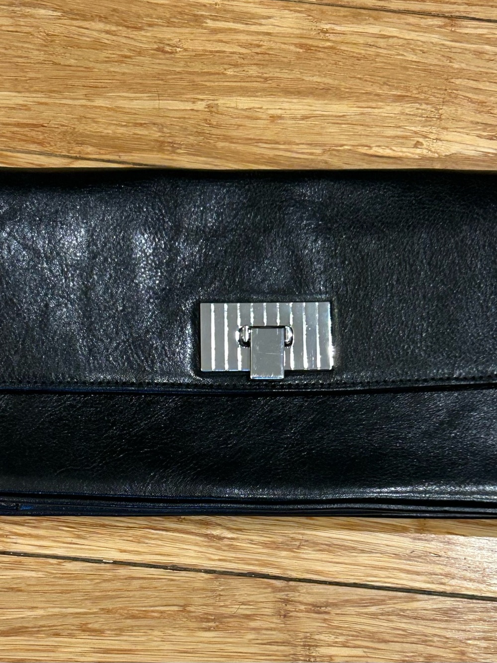 Wilsons Leather Vintage Black Clutch with Silver-Tone Turn Lock
